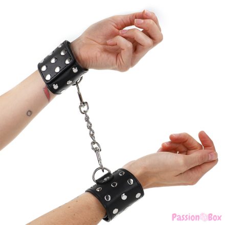KINK - WRIST RESTRAINTS WITH SNAP FASTEN FULL OF RIVETS BLACK ADJUSTABLE 19-24 CM X 5.5 CM